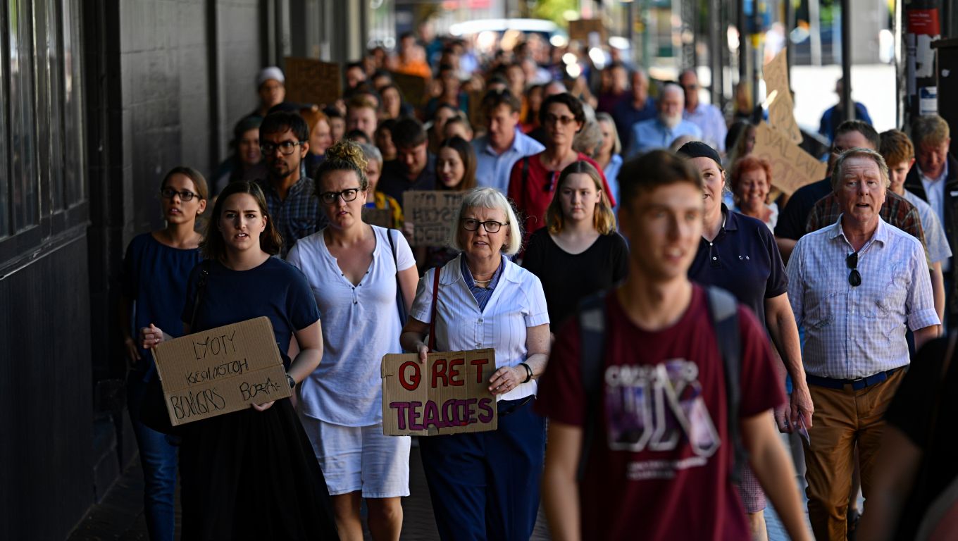 Thousands of teachers walk off the job across Queensland over a class size dispute