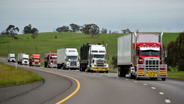 ʼEnough is enoughʼ: a convoy of truck drivers rolls towards Canberra over new fuel taxes and toll rules